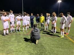 Coach Solakoglu gives a speech to the team. 