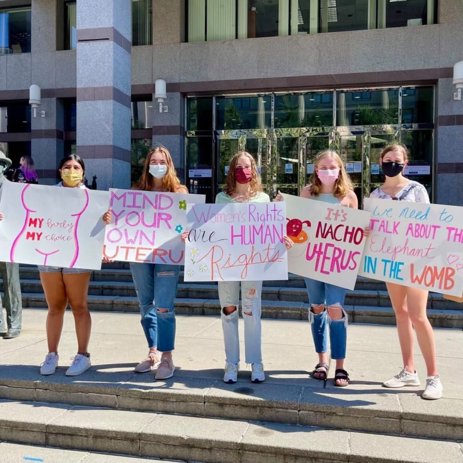 Green Level students protesting in Downtown Raleigh for Abortion Justice.