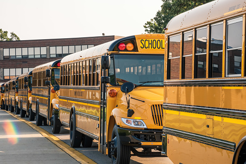 Students who take the bus are usually on time, but those who drive or use carpool can fall behind. Image from Unsplash.