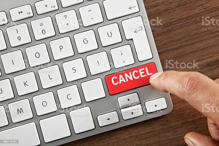 Man+pushing+Cancel+Button+on+computer+keyboard.+Image+from+iStock.