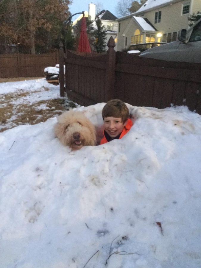 Jake and his dog in the snow. 