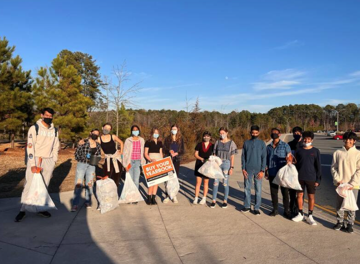 Members attending a school-campus clean up event after school.