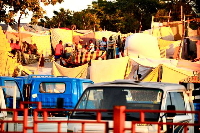 The situation in Haiti right now is similar to the displacement of Haiti People in 2010, with many Haitians living in makeshift tents after being displaced from their homes. Image via Nara & Dvids Public Domain Archive