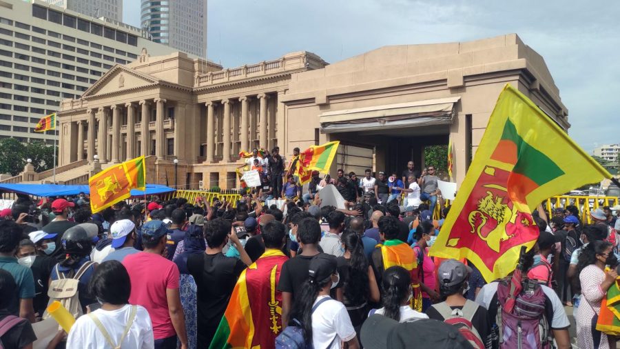 Anti-government protest for economic action in Sri Lanka on April 13, 2022 in front of the Presidential Secretariat. Image via. Wikimedia Commons