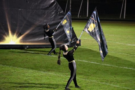 The Green Level Colorguard performing at Cary Band Day. 