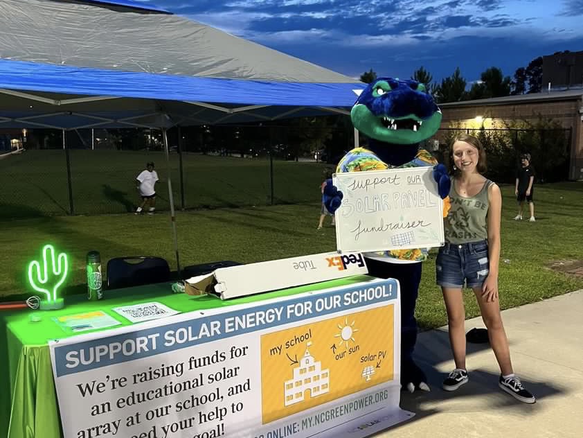 Sophomore Taylor Hill tabling at a Green Level football game.