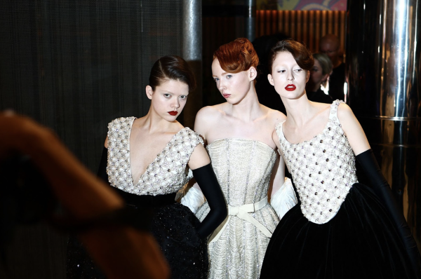 Models gather backstage at the Richard Quinn show during London Fashion Week. Henry Nicholls/AFP/Getty Images