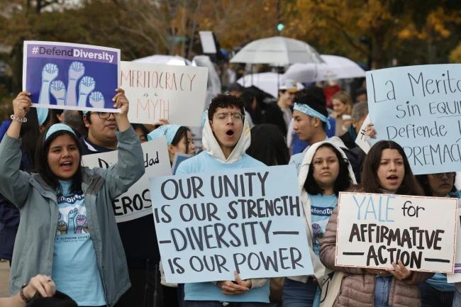 Supporters of affirmative action in higher education rally in front of the Supreme Court.