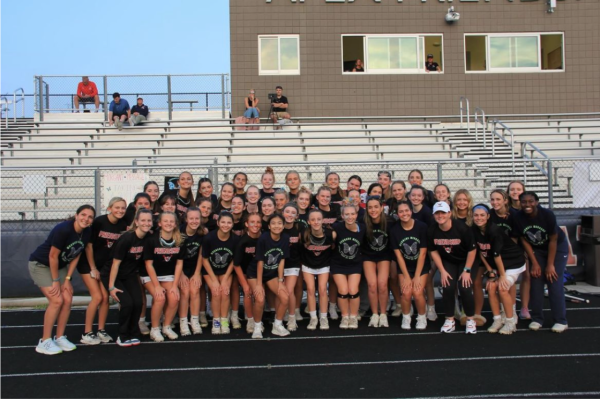 The Apex Friendship and Green Level Varsity women’s lacrosse teams huddled together prior to the start of the 2024 Morgan’s Message dedication game. The two teams came together for one cause, common goal, and mission; namely, to change the stigma surrounding mental health, specifically throughout student-athlete populations.  
