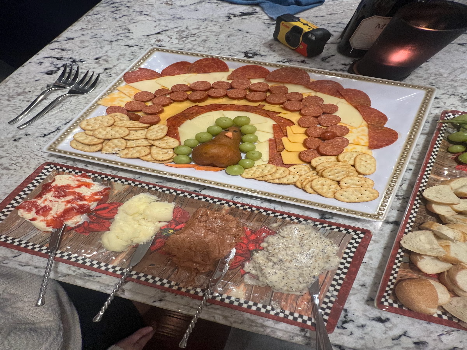 A picture of our charcuterie board, designed as a Turkey. This is a dish our younger cousins designed in order for each family member to actively participate in the cultivation of our Thanksgiving dinner. 