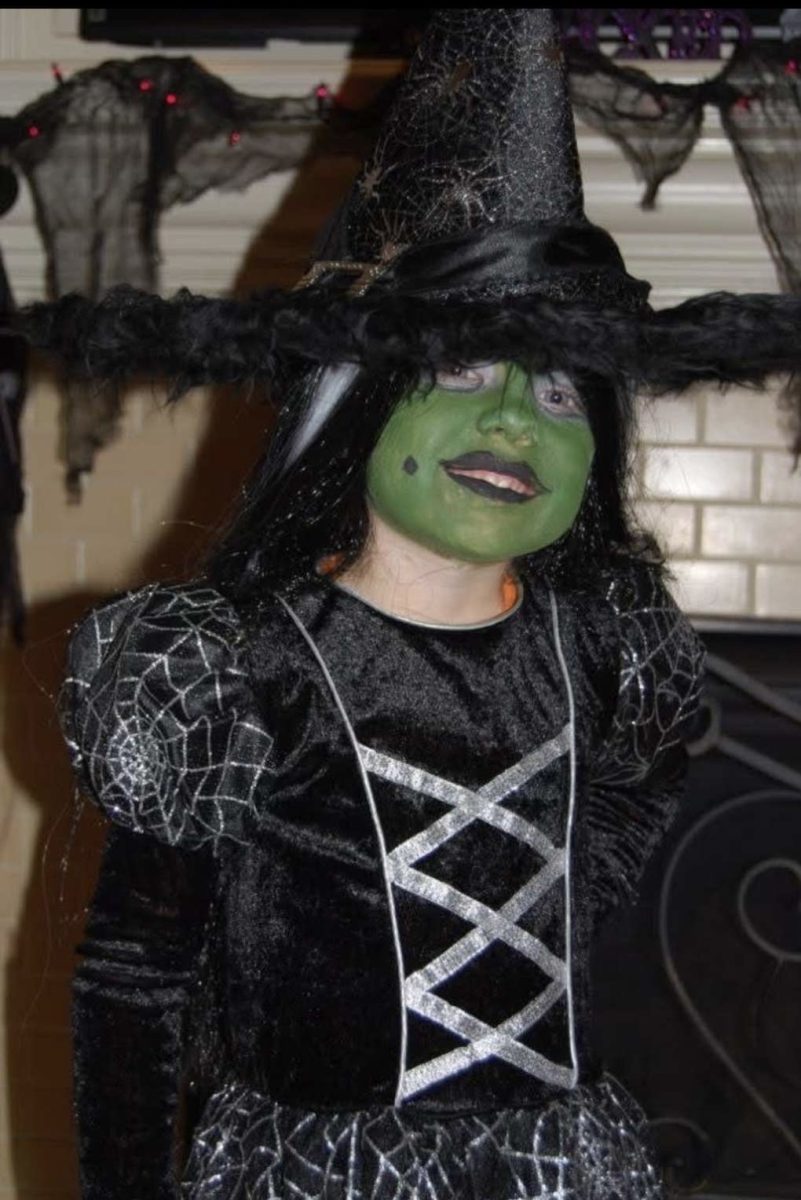 This is me as the Wicked Witch of the West. After attending the musical that summer I felt inspired on Halloween to dress as Elphaba.                