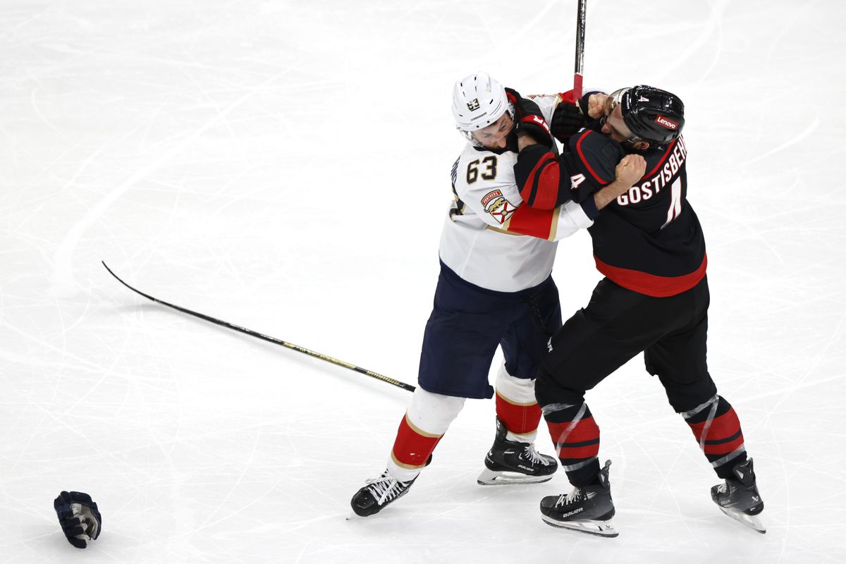 Carolina’s Shayne Gostisbehere #4 and Florida’s Brad Marchand getting in a brawl. 