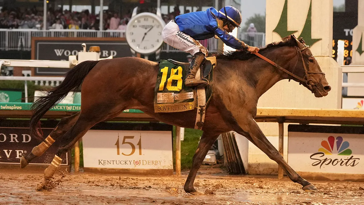 Kentucky Derby Winner Sovereignty crossing the turbid finish line. 