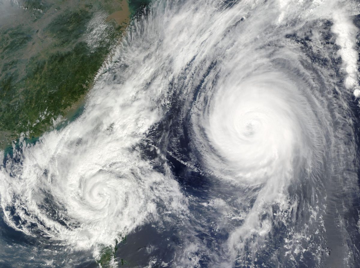 The Fujiwhara effect led to hurricane paths that differed from predictions.