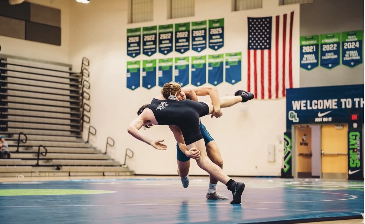 Senior Tommy Gingerich at the opening wrestling match. 
